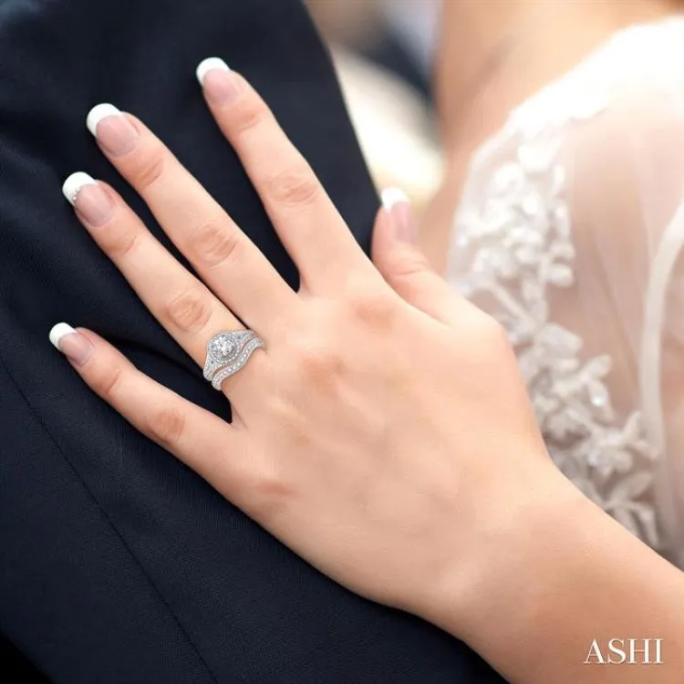 1 1/10 Ctw Diamond Wedding Set with 7/8 Ctw Round Cut Engagement Ring and 1/5 Ctw Wedding Band in 14K White Gold