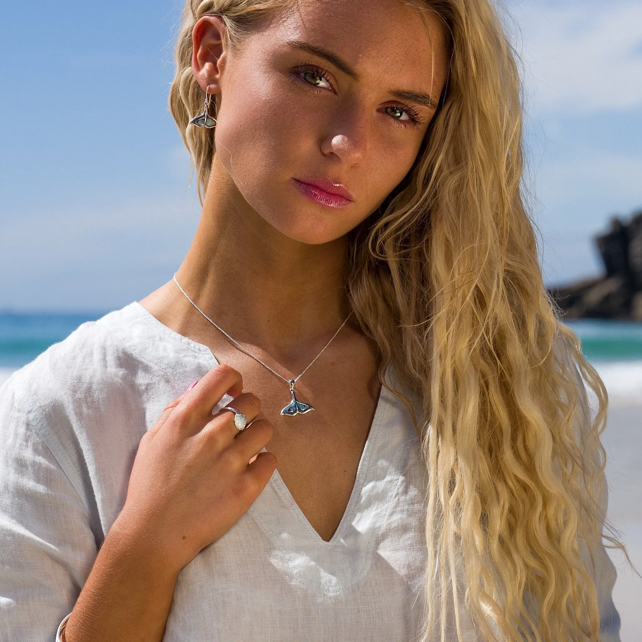 Paua Shell Whale's Tail Earrings