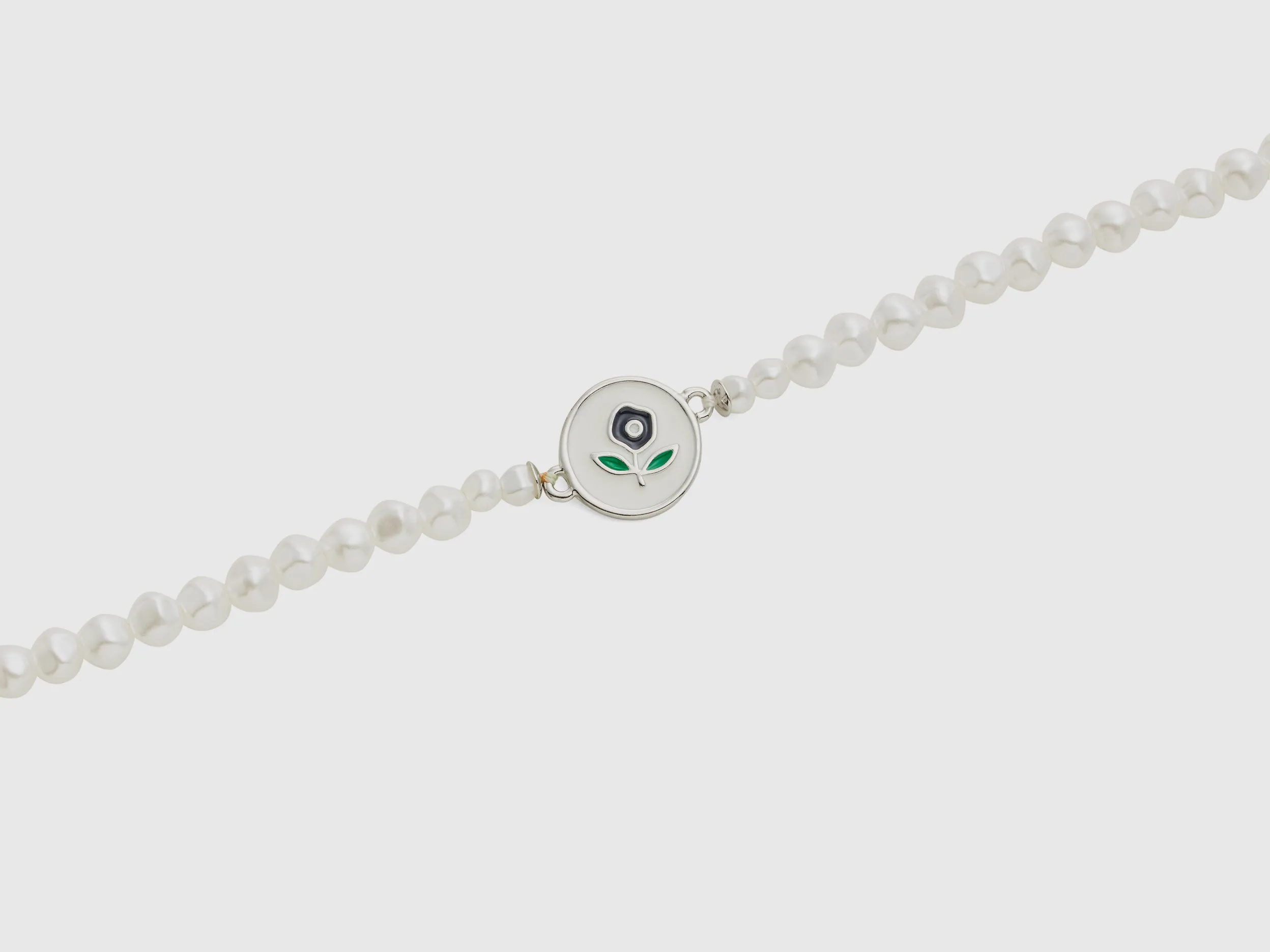 White Pearl Strand Necklace with Dark Blue Flower Motif